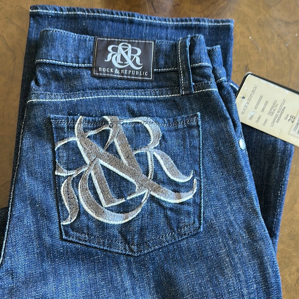 NWT low rise Kassandra Rock & Republic jeans size 28. Color is Deprived Wealth.